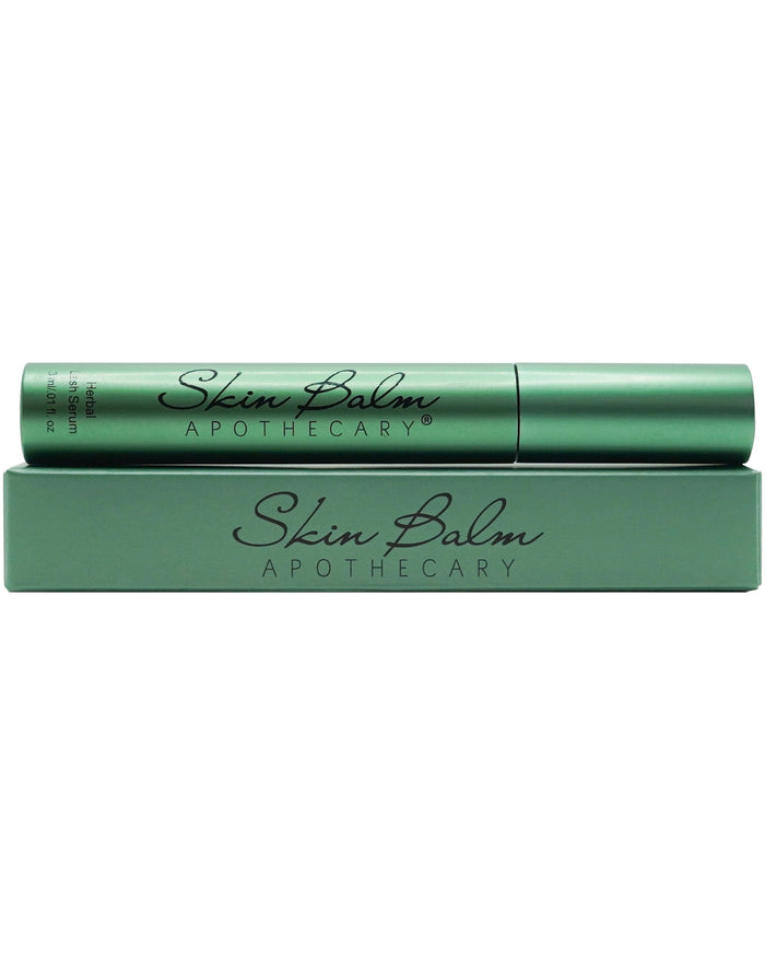 Herbal Lash Serum with packaging against a white background.